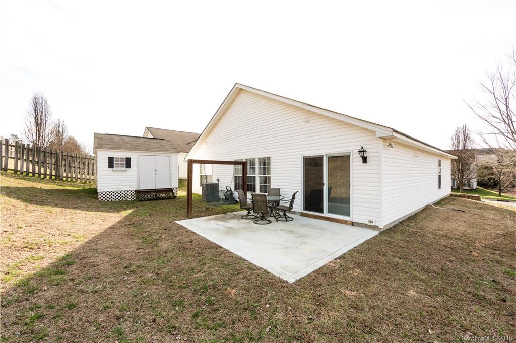 236 Grayland Road Mooresville, NC 28115 - Photo 26 of 27 a view of a house with backyard and sitting area