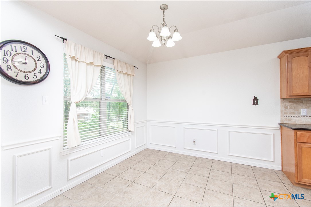 568 Morgan's Point Road Belton, TX 76513 - Photo 7 of 20 a view of a kitchen with dishwasher and a large window