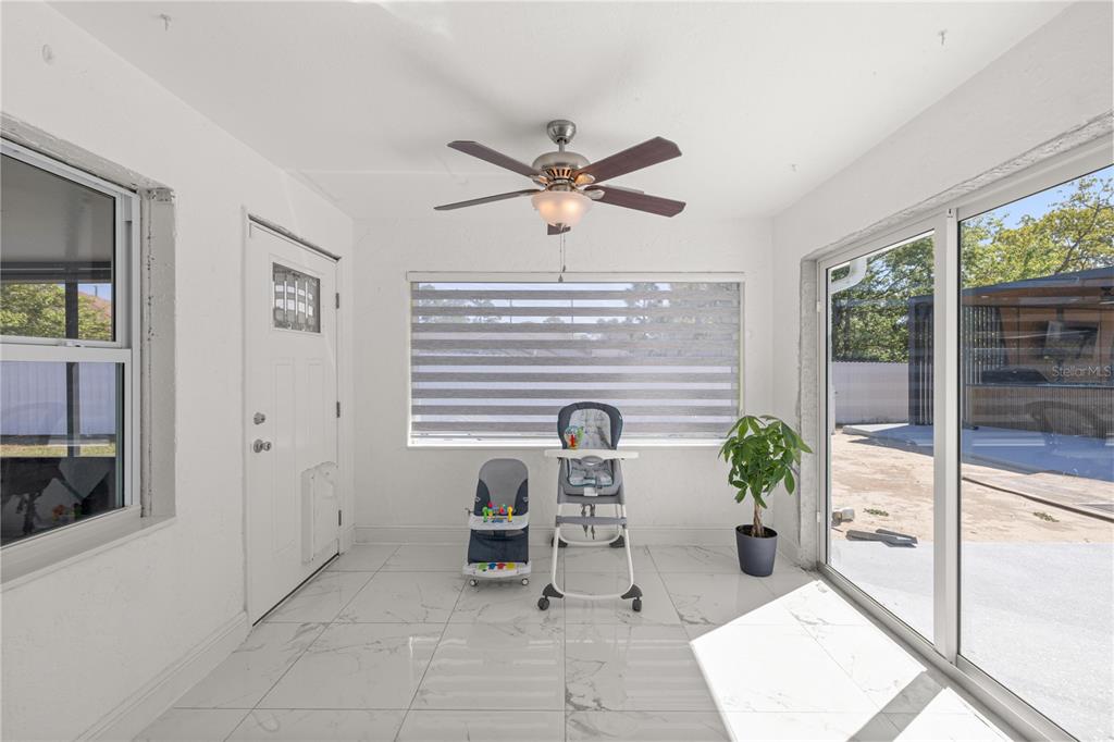 7191 Hemlock Road Ocala, FL 34472 - Photo 11 of 34 a view of a workspace with furniture and a window