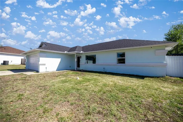 a house view with a garden space