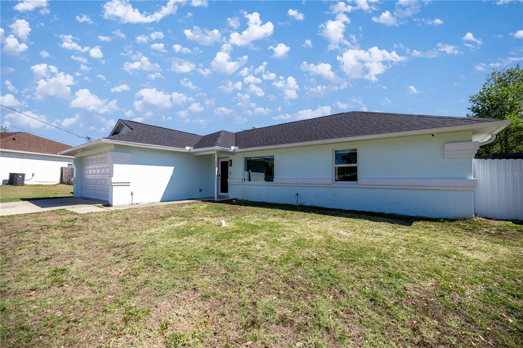 7191 Hemlock Road Ocala, FL 34472 - Photo 7 of 34 a house view with a garden space