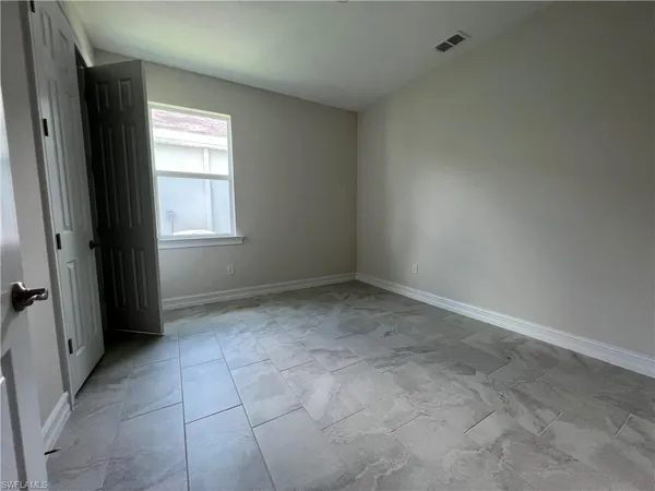 an empty room with a window