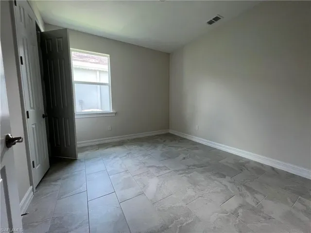 an empty room with a window