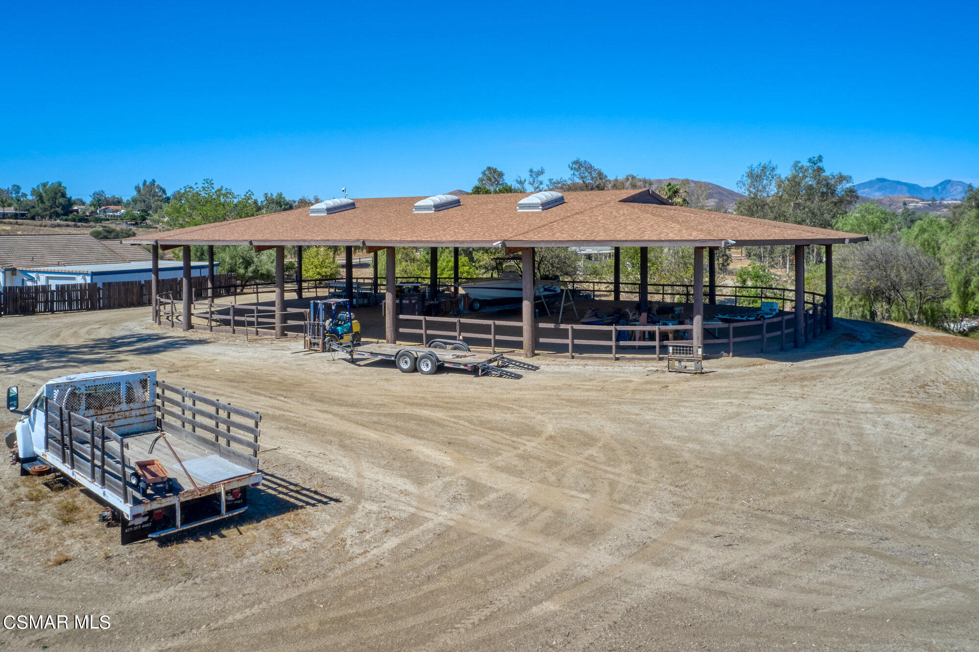 17498 Santa Rosa Mine Road Perris, CA 92570 - Photo 15 of 55 an outdoor space with patio and barbeque oven