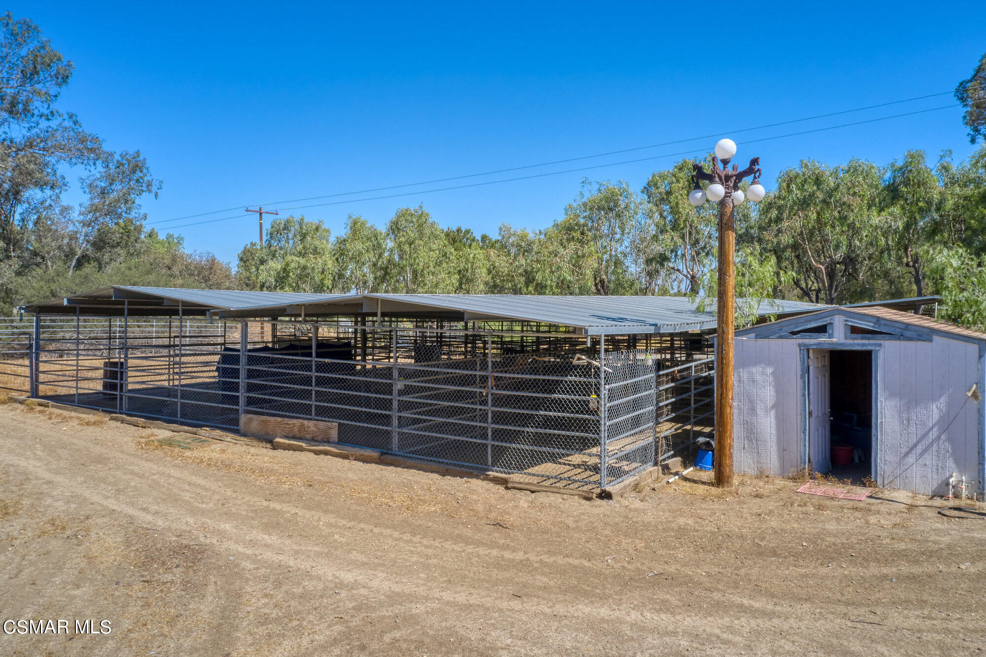 17498 Santa Rosa Mine Road Perris, CA 92570 - Photo 23 of 55 a view of a deck with a backyard