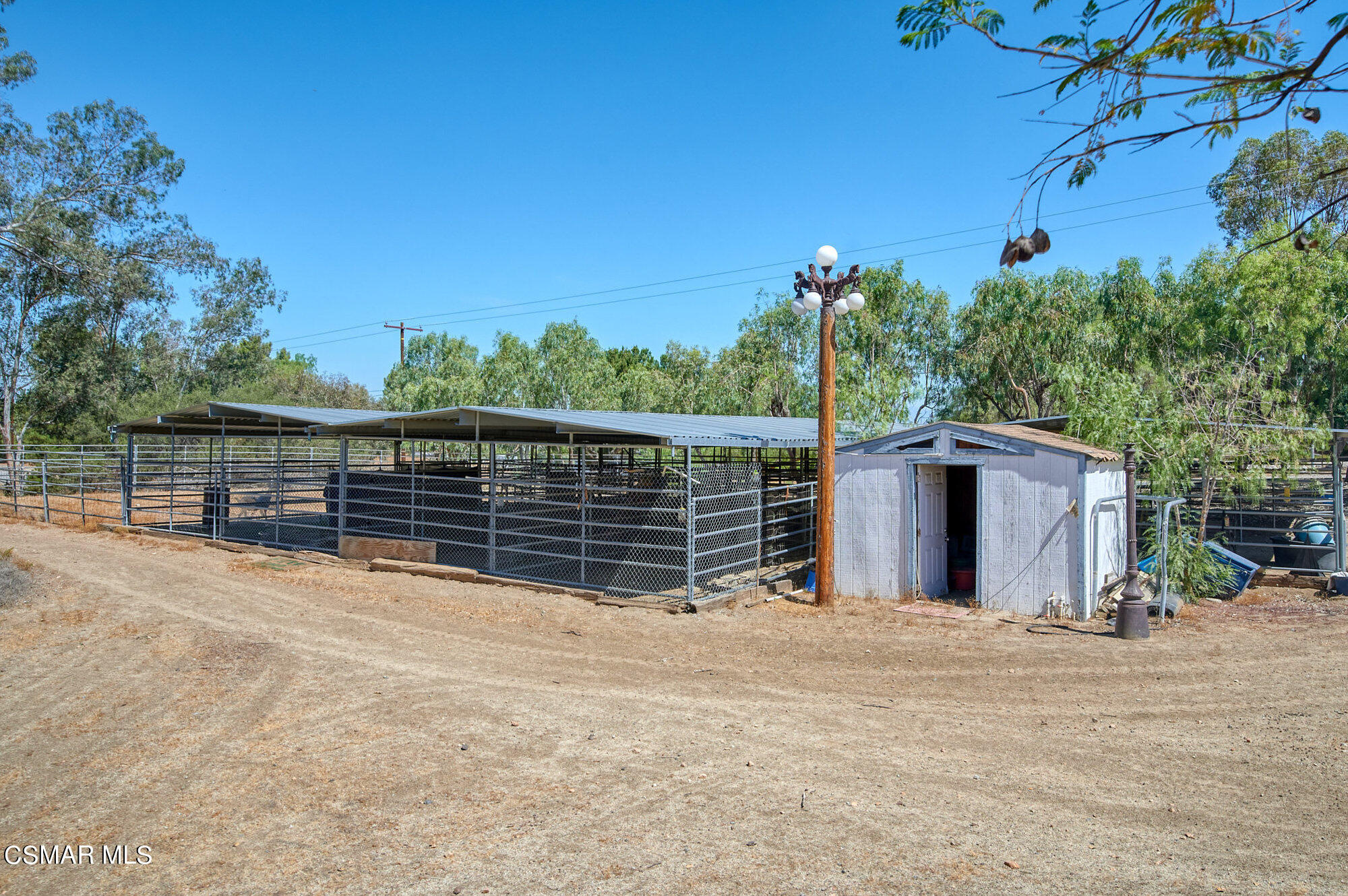 17498 Santa Rosa Mine Road Perris, CA 92570 - Photo 25 of 55 a view of a fence with an outdoor space