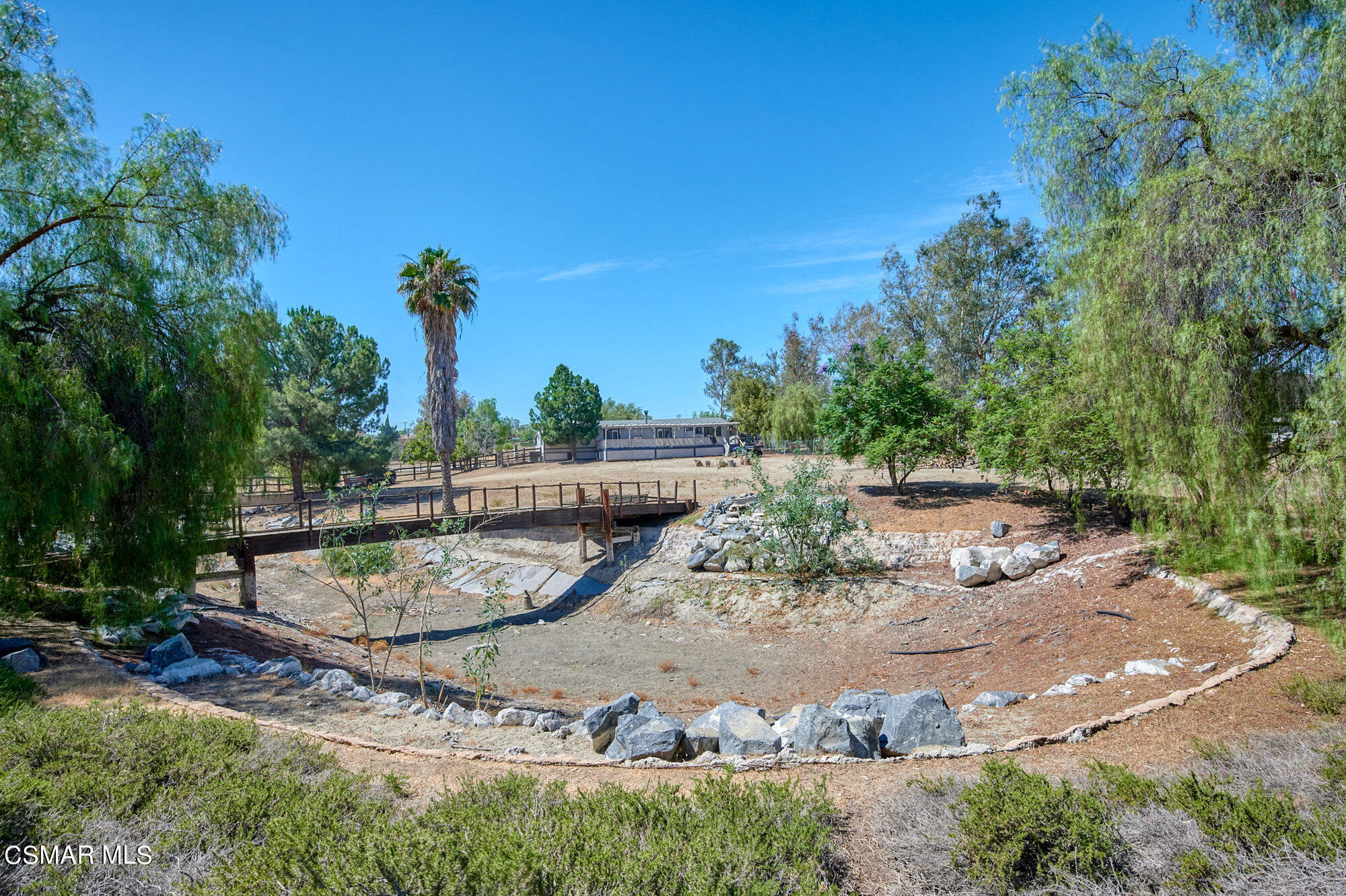 17498 Santa Rosa Mine Road Perris, CA 92570 - Photo 27 of 55 a backyard of a house with table and chairs