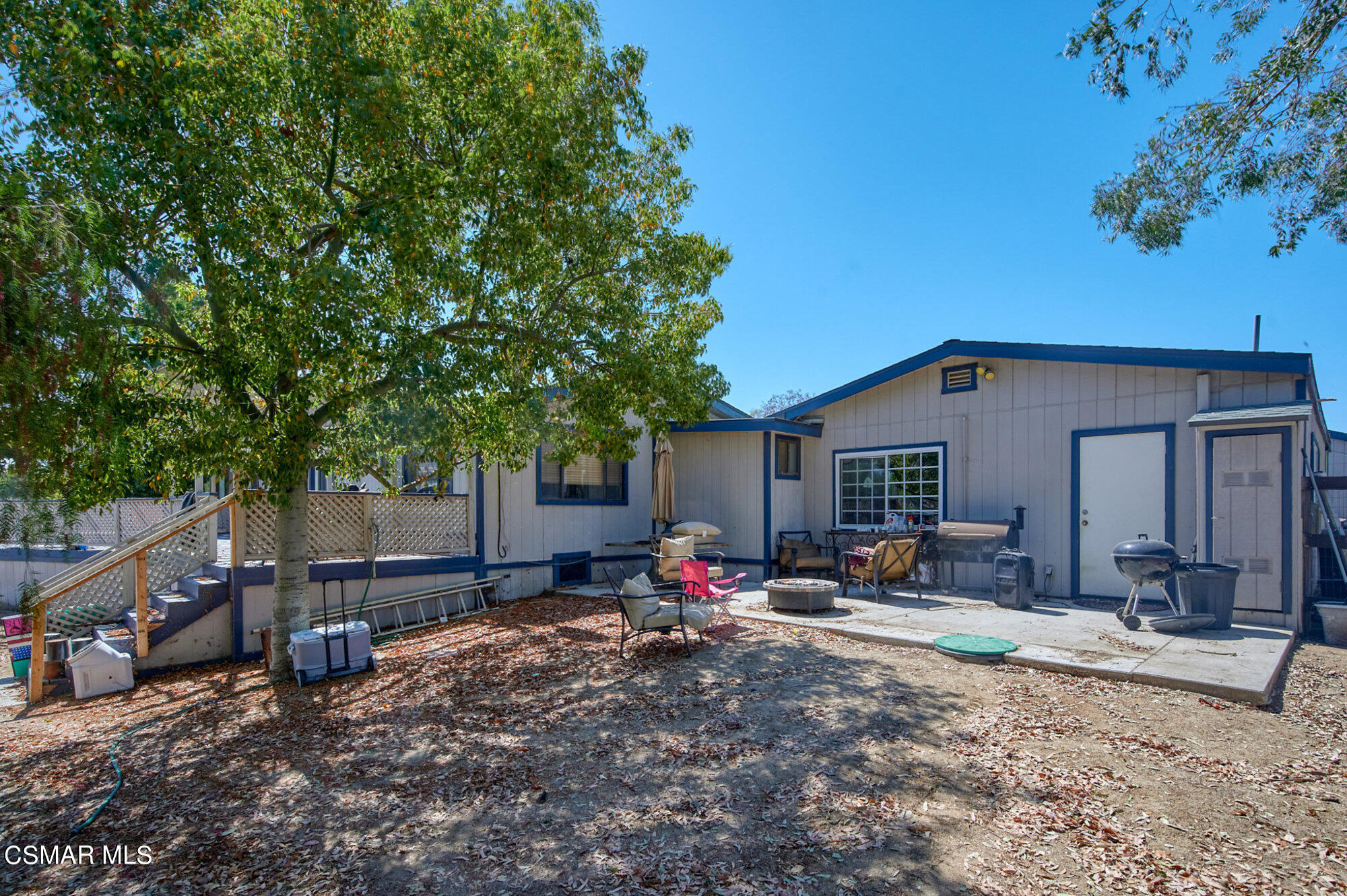 17498 Santa Rosa Mine Road Perris, CA 92570 - Photo 34 of 55 a view of a backyard with a sitting area