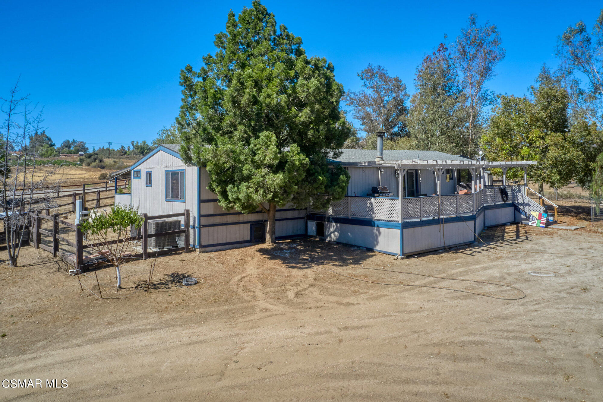 17498 Santa Rosa Mine Road Perris, CA 92570 - Photo 35 of 55 a view of a house with roof and sitting area