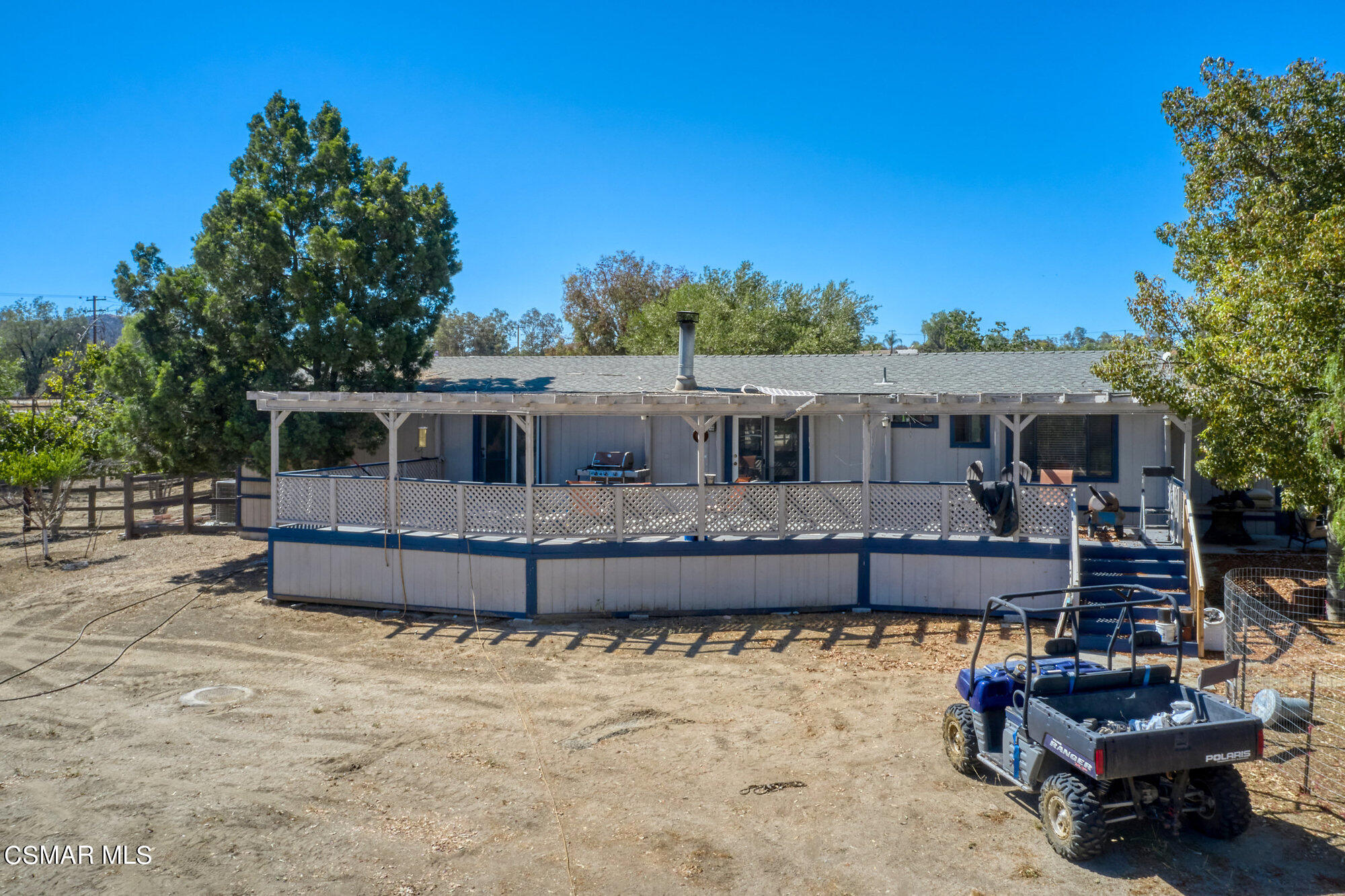 17498 Santa Rosa Mine Road Perris, CA 92570 - Photo 36 of 55 a front view of a house with a yard