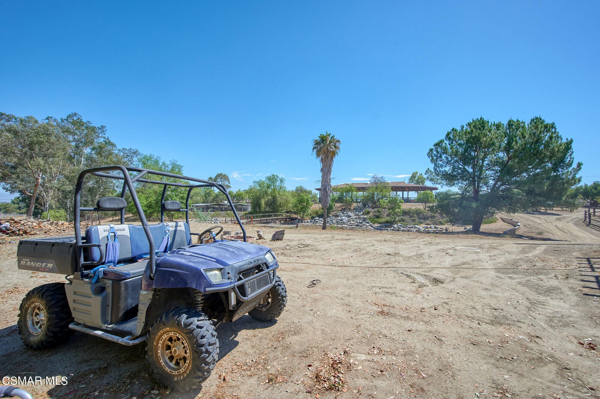 17498 Santa Rosa Mine Road Perris, CA 92570 - Photo 39 of 55 a view of a yard with table and chairs