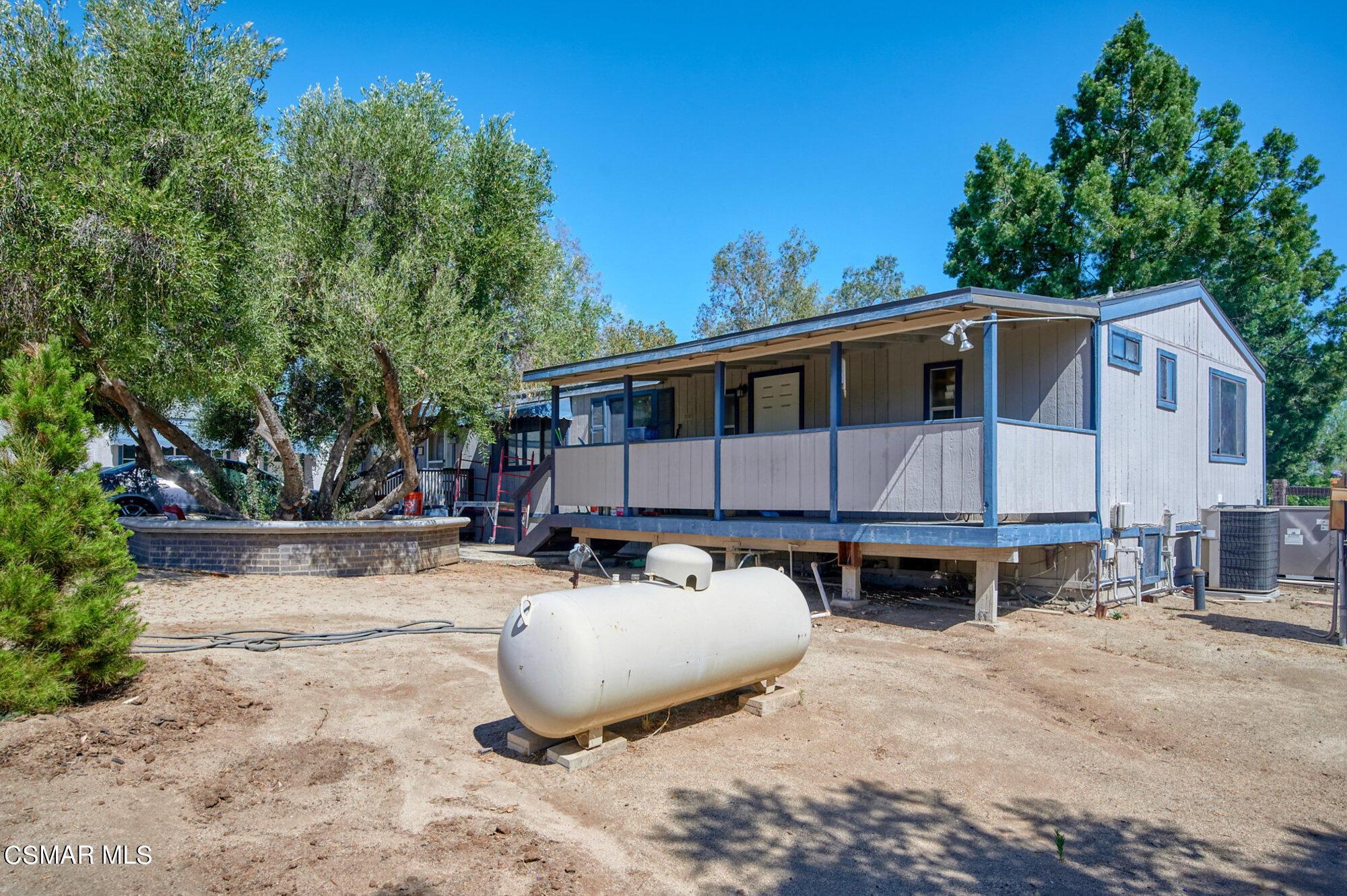 17498 Santa Rosa Mine Road Perris, CA 92570 - Photo 41 of 55 a front view of a house with a yard