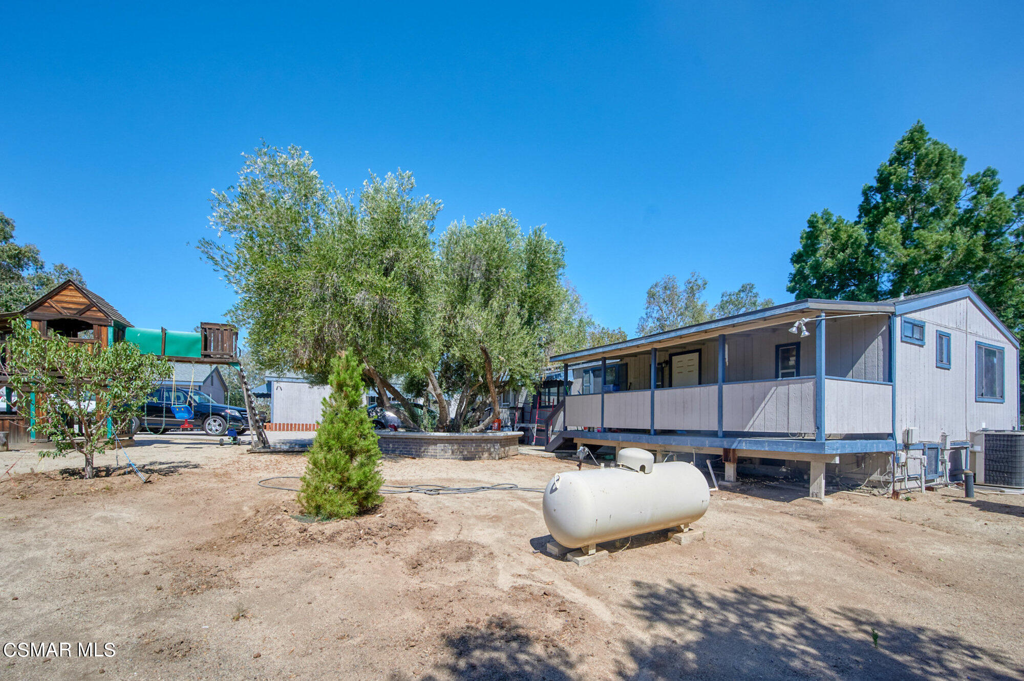 17498 Santa Rosa Mine Road Perris, CA 92570 - Photo 42 of 55 a view of a house with backyard