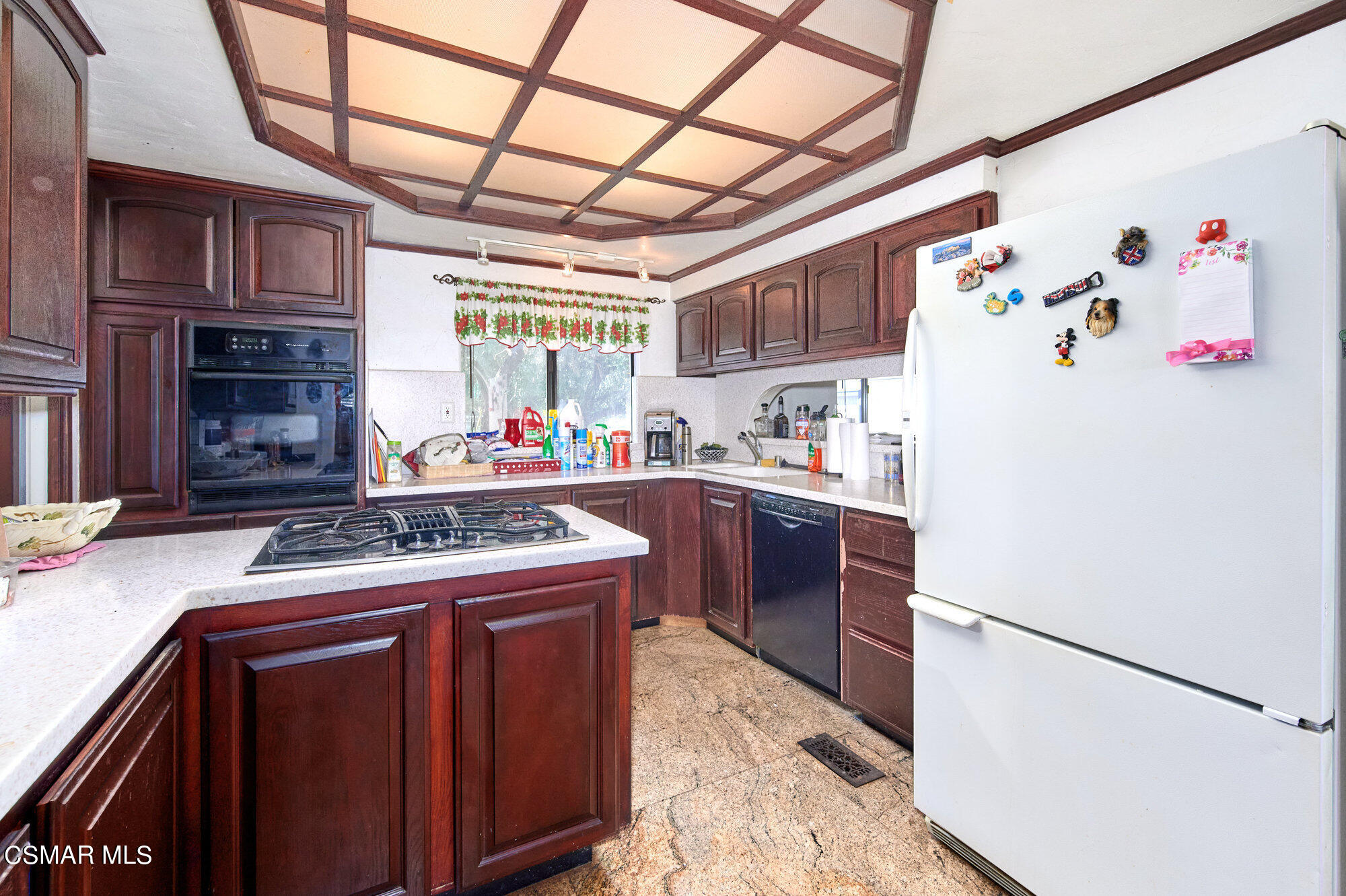17498 Santa Rosa Mine Road Perris, CA 92570 - Photo 43 of 55 a kitchen with stainless steel appliances granite countertop a stove a refrigerator and a sink
