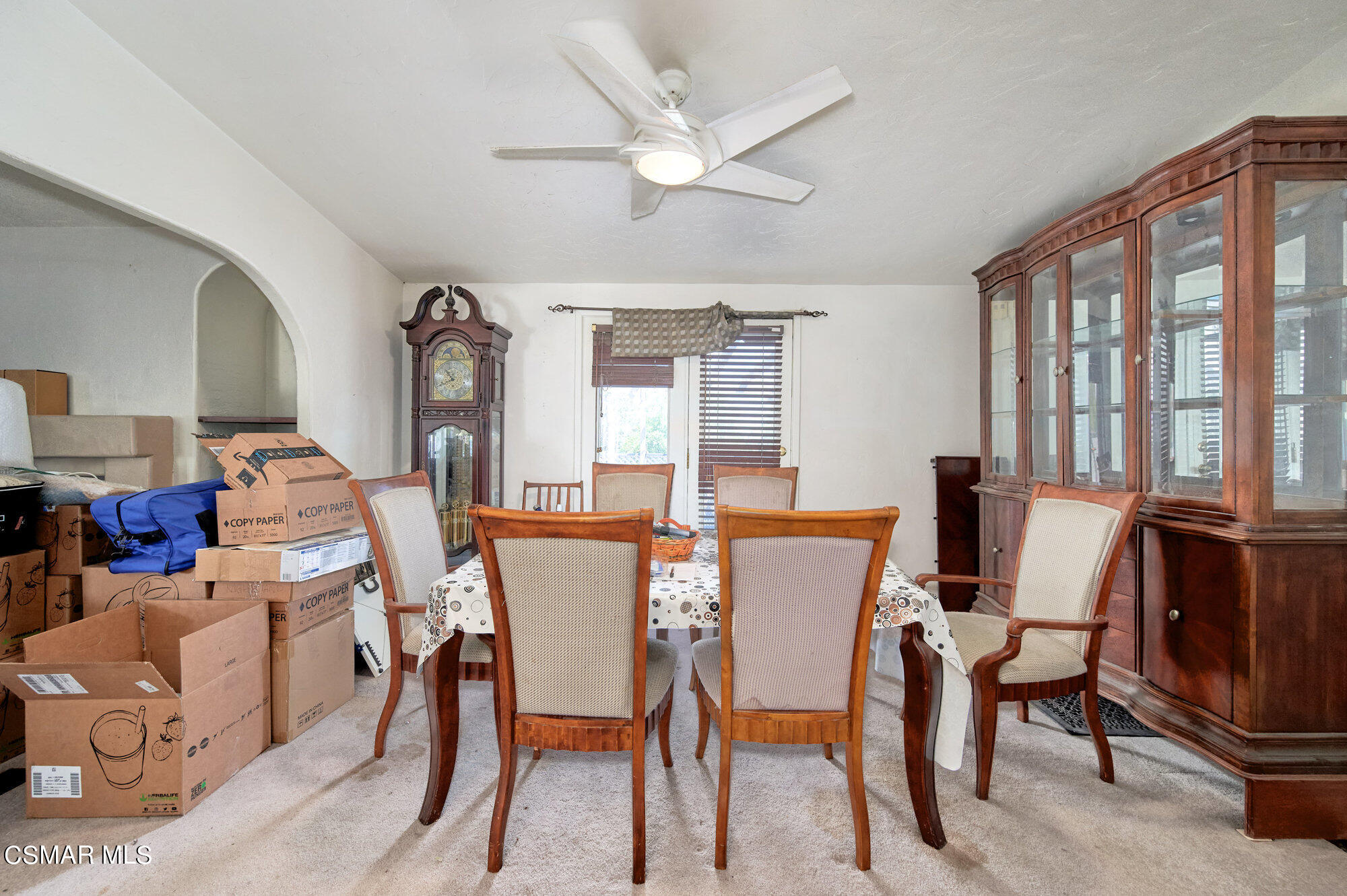 17498 Santa Rosa Mine Road Perris, CA 92570 - Photo 46 of 55 a view of a dining room with furniture window and wooden floor