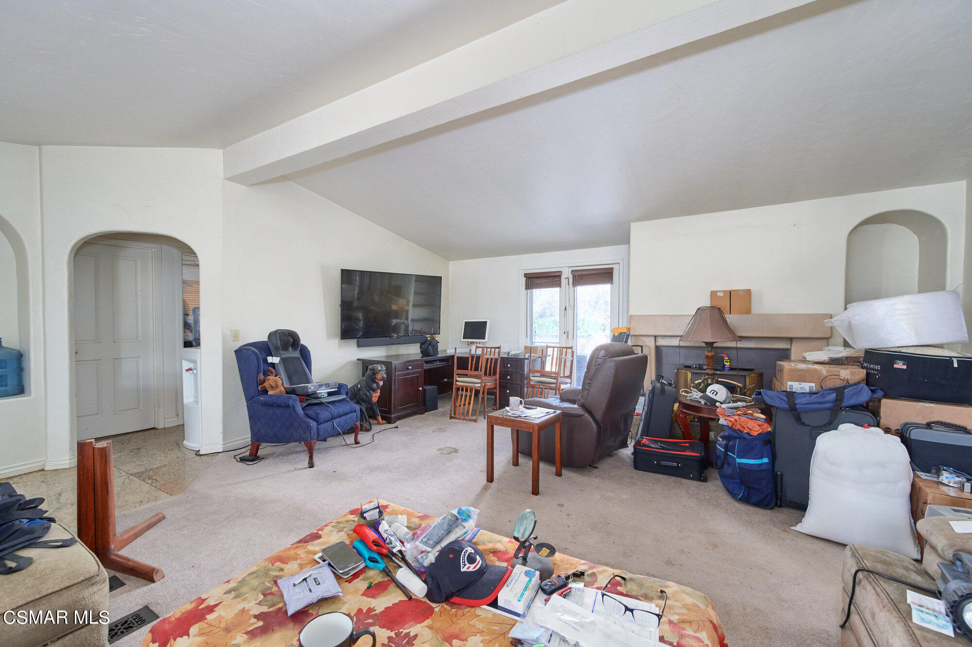 17498 Santa Rosa Mine Road Perris, CA 92570 - Photo 48 of 55 a living room with furniture fireplace and a window