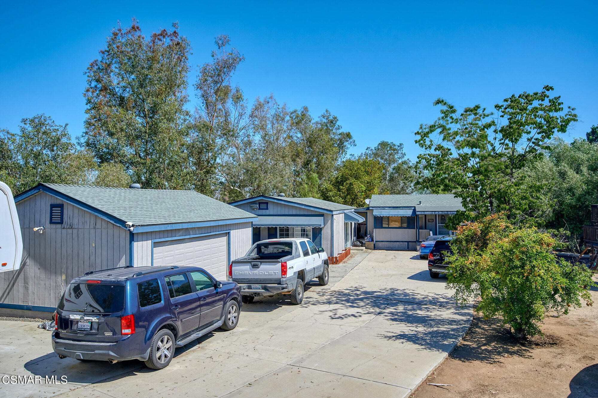17498 Santa Rosa Mine Road Perris, CA 92570 - Photo 10 of 55 a car parked in front of a house