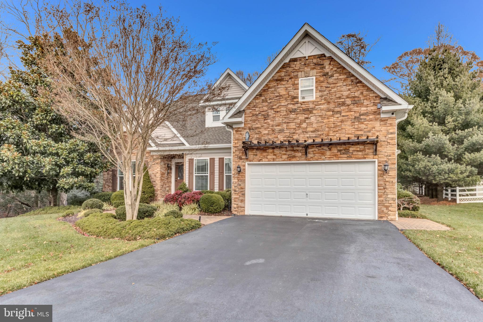 24872 Rivers Edge Road Millsboro, DE 19966 - Photo 2 of 80 front view of a house with a yard
