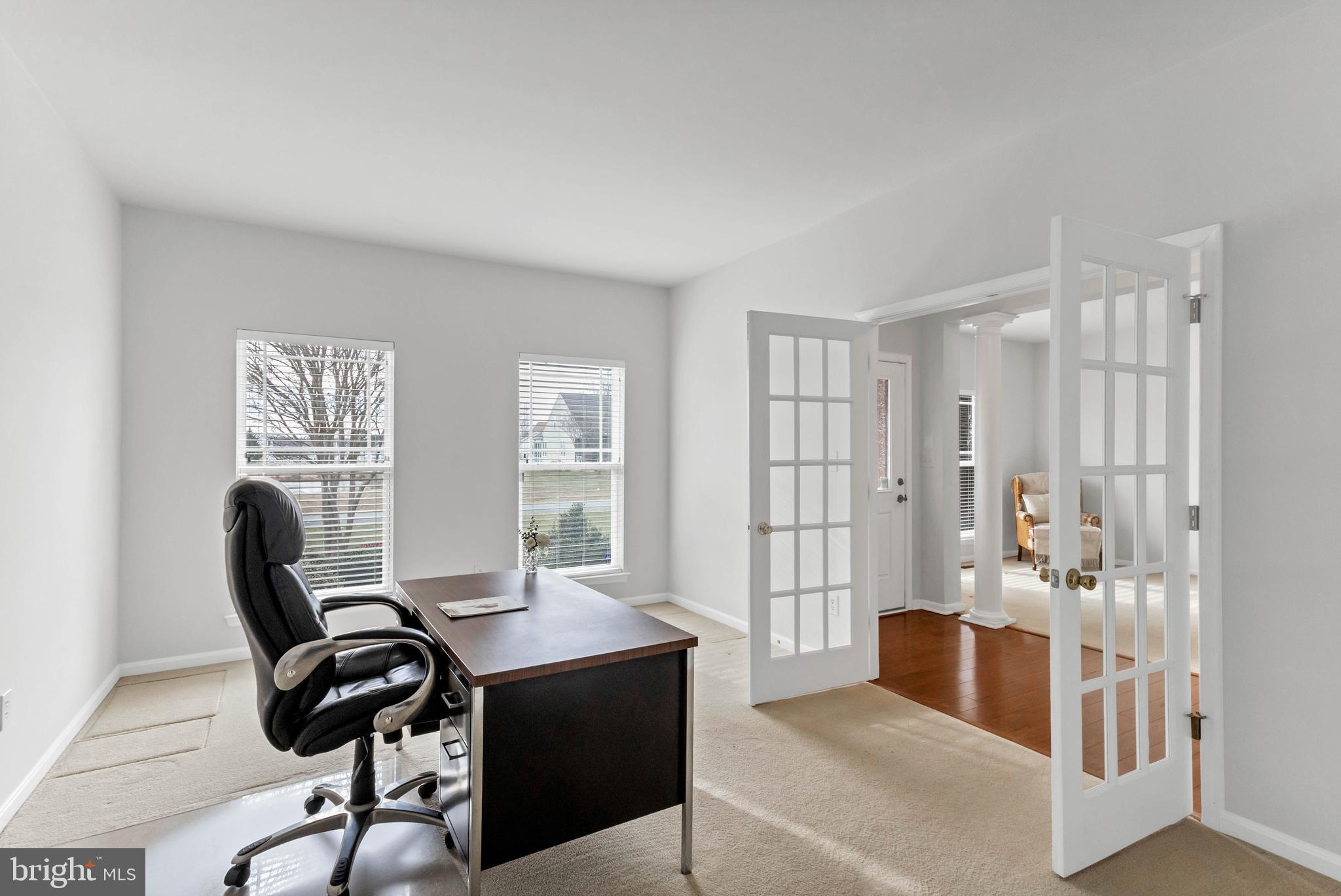 24872 Rivers Edge Road Millsboro, DE 19966 - Photo 33 of 80 a view of a workspace with furniture and a window