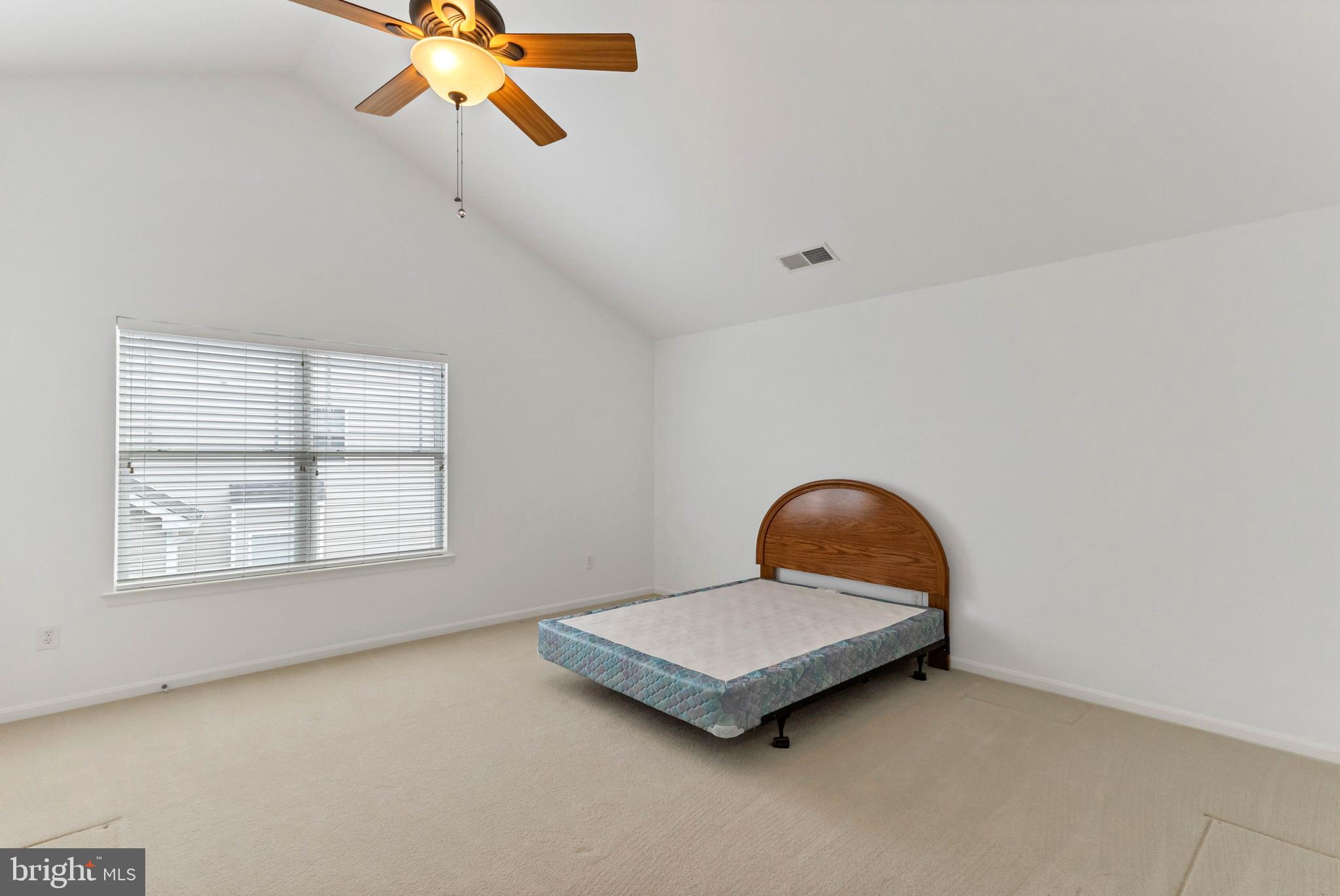 24872 Rivers Edge Road Millsboro, DE 19966 - Photo 46 of 80 a bedroom with bed and window