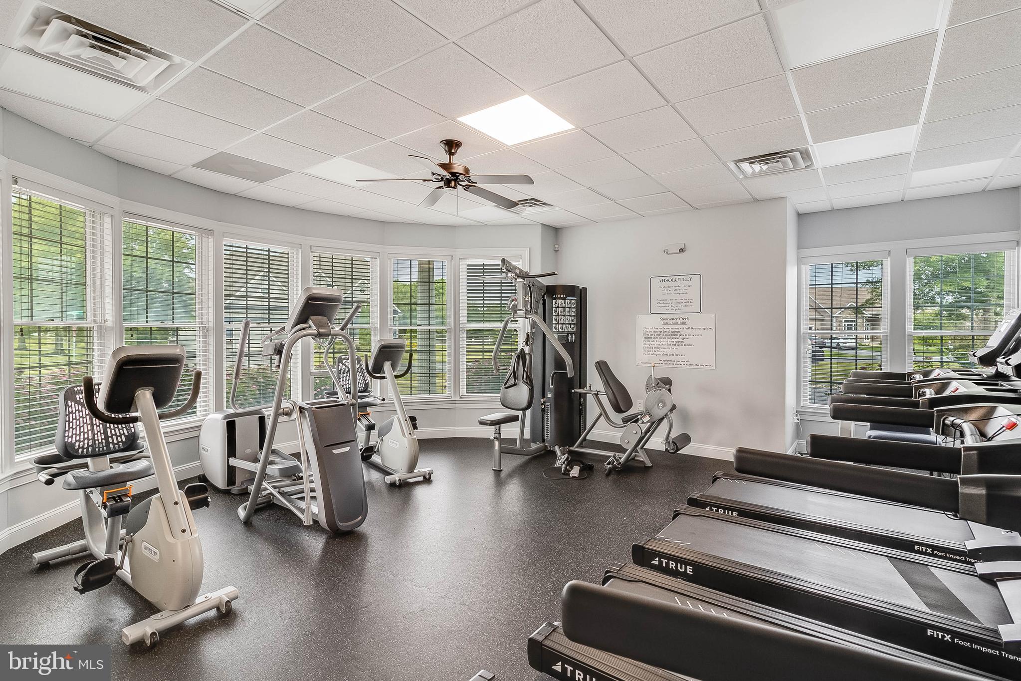 24872 Rivers Edge Road Millsboro, DE 19966 - Photo 76 of 80 a view of a room with gym equipment