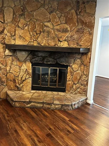 a living room with a fireplace