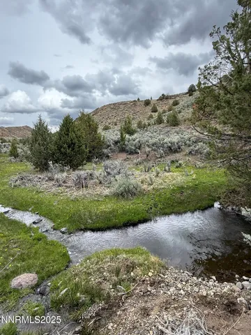a view of a pathway with a yard