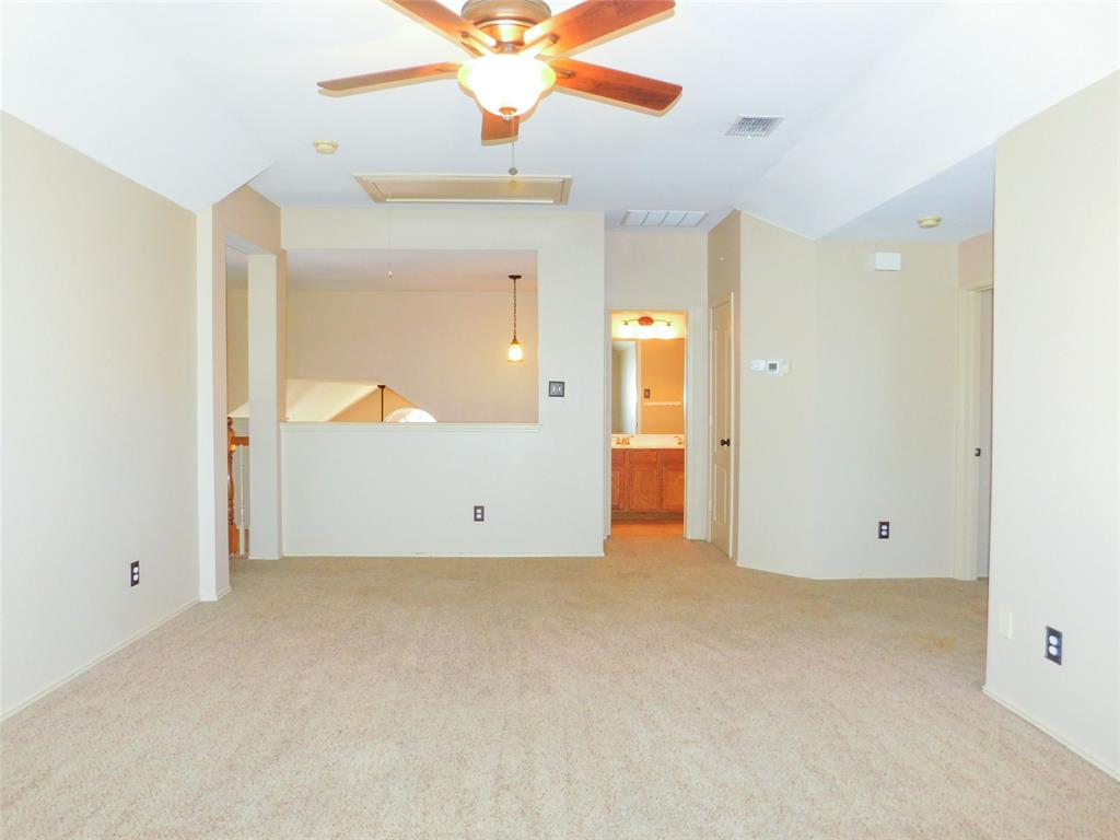 2724 Hereford Road Denton, TX 76210 - Photo 22 of 34 an empty room with a bathroom