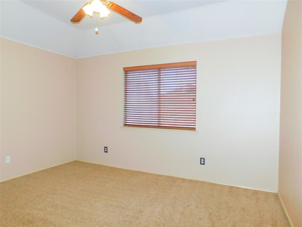 2724 Hereford Road Denton, TX 76210 - Photo 29 of 34 an empty room with a window