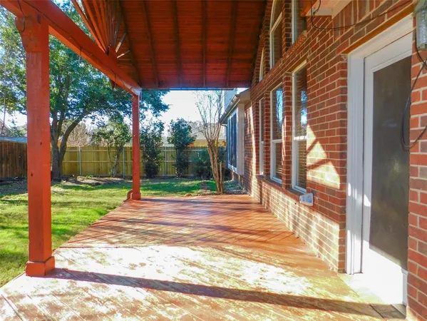 a view of backyard with green space