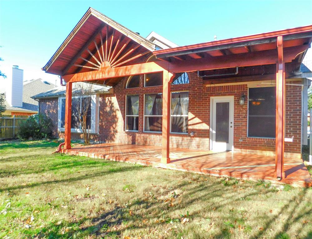 2724 Hereford Road Denton, TX 76210 - Photo 33 of 34 a view of a house with a yard and porch
