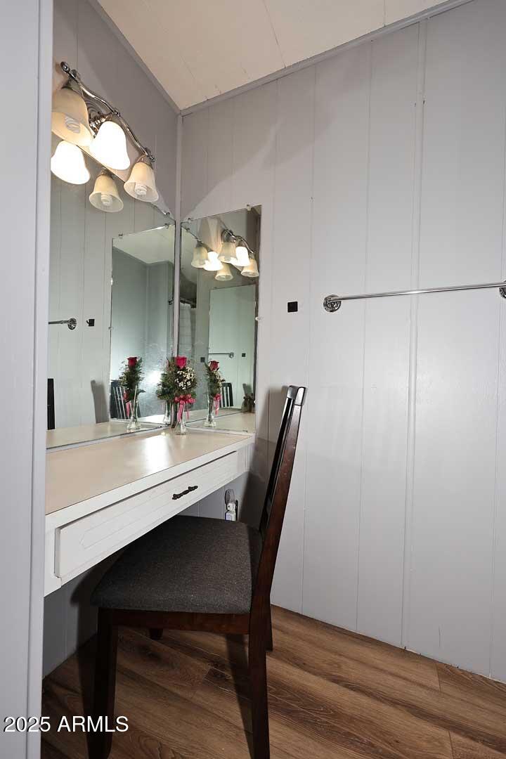 5201 West Camelback Road, Unit 243 Phoenix, AZ 85031 - Photo 16 of 27 a dining room with furniture and wooden floor