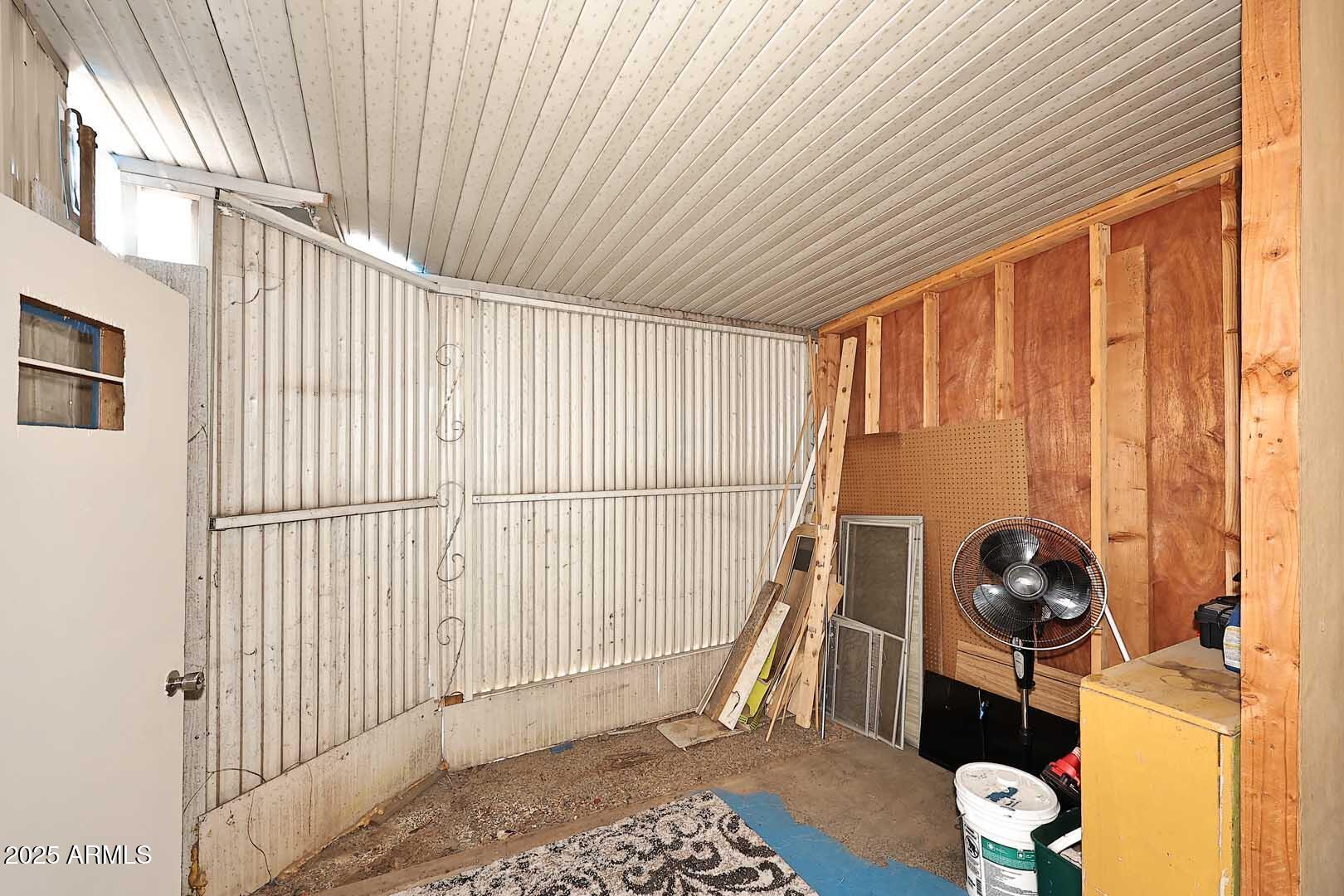 5201 West Camelback Road, Unit 243 Phoenix, AZ 85031 - Photo 24 of 27 a view of entryway with wooden floor