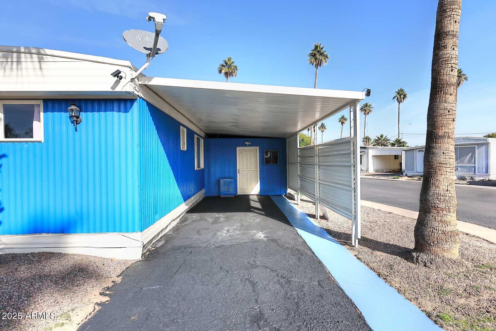 5201 West Camelback Road, Unit 243 Phoenix, AZ 85031 - Photo 4 of 27 a view of a house with a balcony
