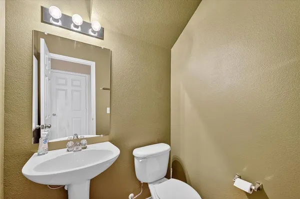 a view of a hallway with entryway