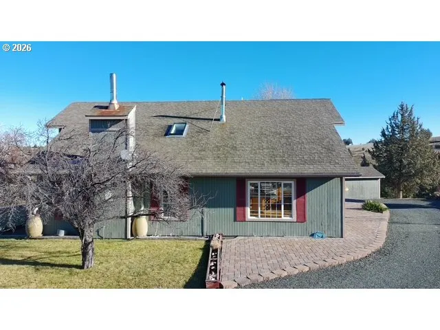 a house view with a outdoor space
