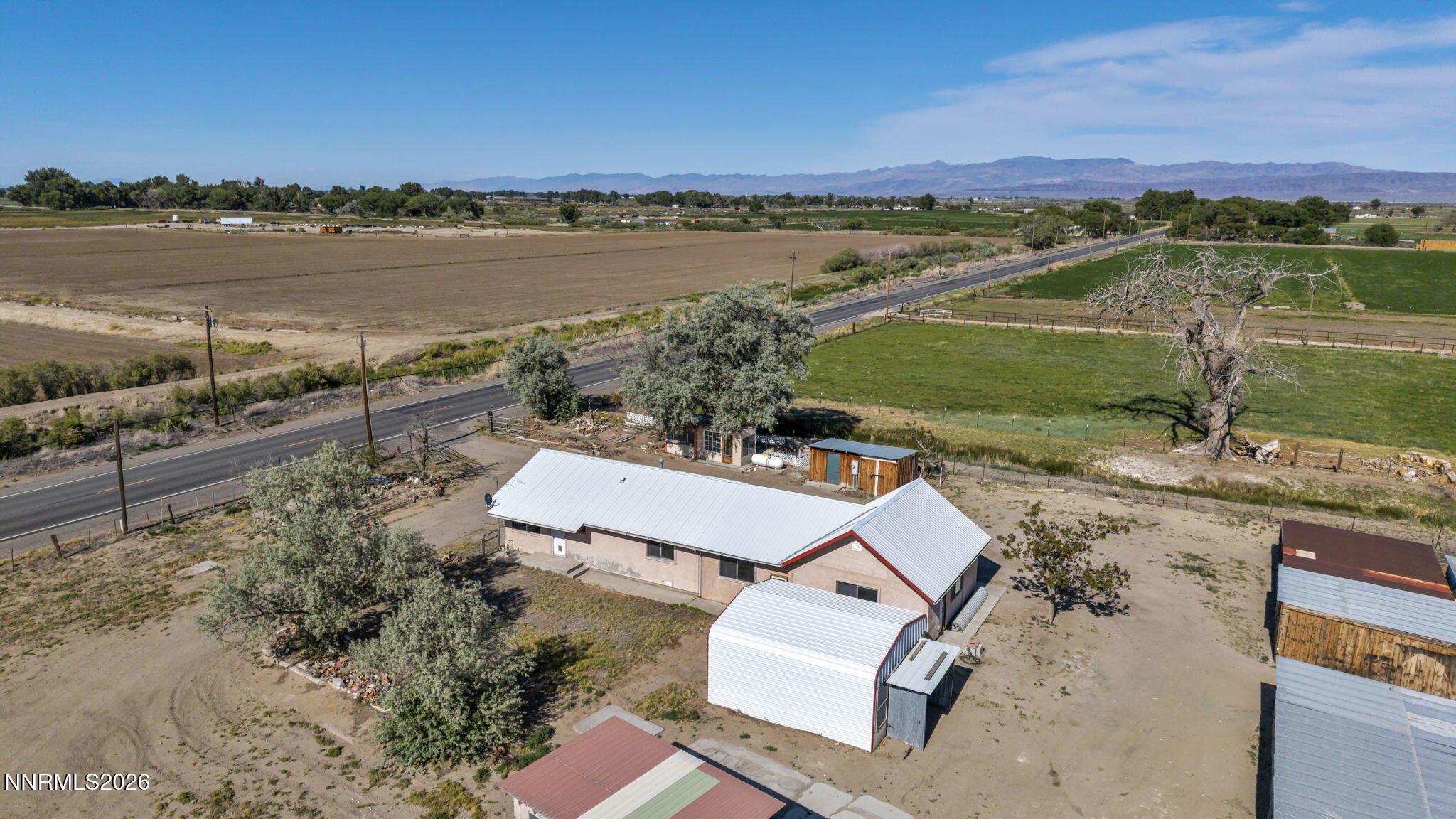 5250 Stillwater Road Fallon, NV 89406 - Photo 52 of 53 an aerial view of a house with a lake view