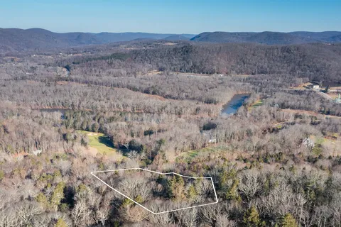 a view of mountains and valleys