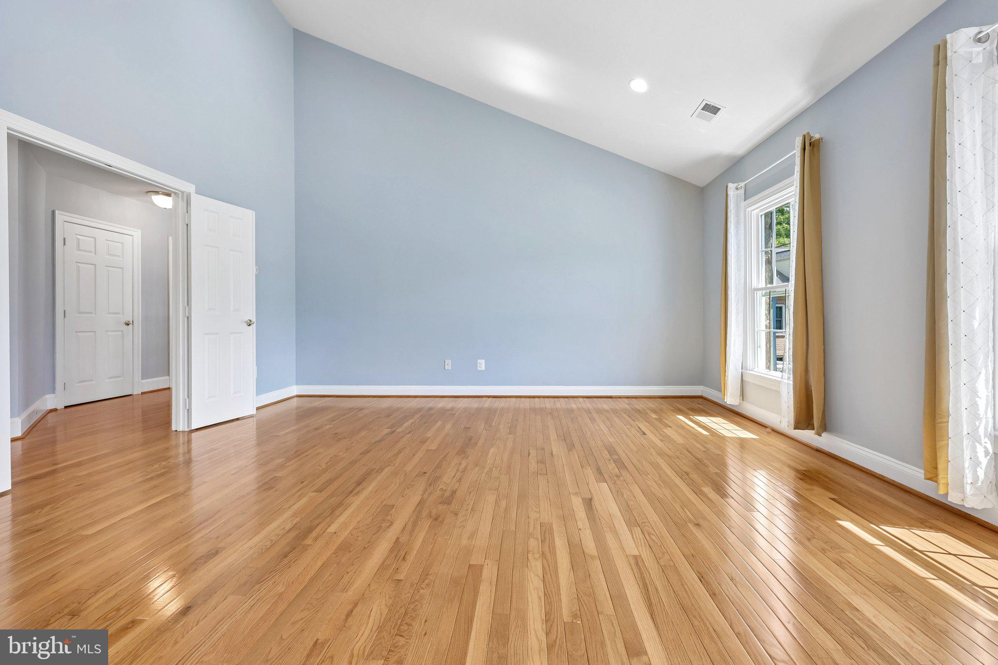 3519 Katrina Court Triangle, VA 22172 - Photo 11 of 101 wooden floor in an empty room with a window
