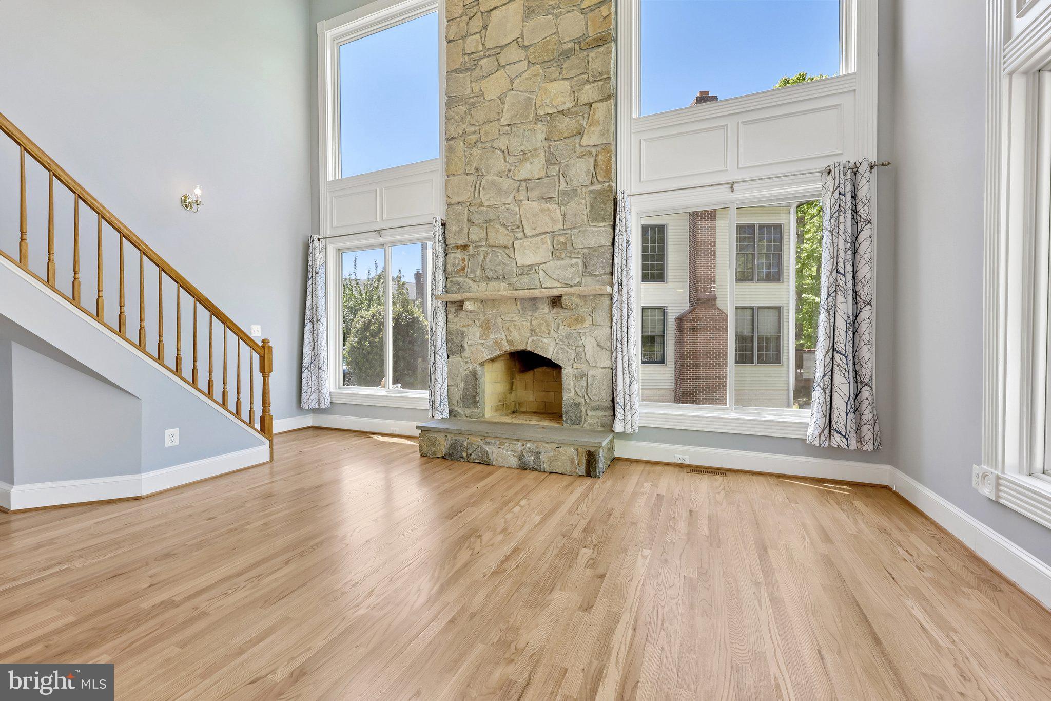 3519 Katrina Court Triangle, VA 22172 - Photo 19 of 101 a view of an empty room with wooden floor fireplace and a window