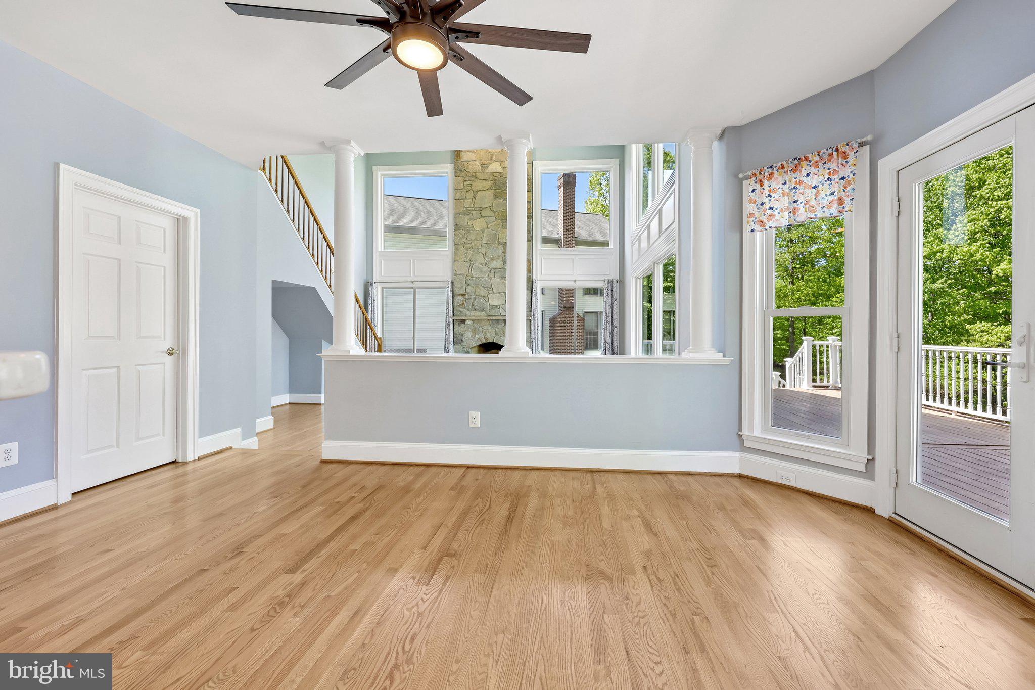 3519 Katrina Court Triangle, VA 22172 - Photo 22 of 101 a view of an empty room with wooden floor and a window