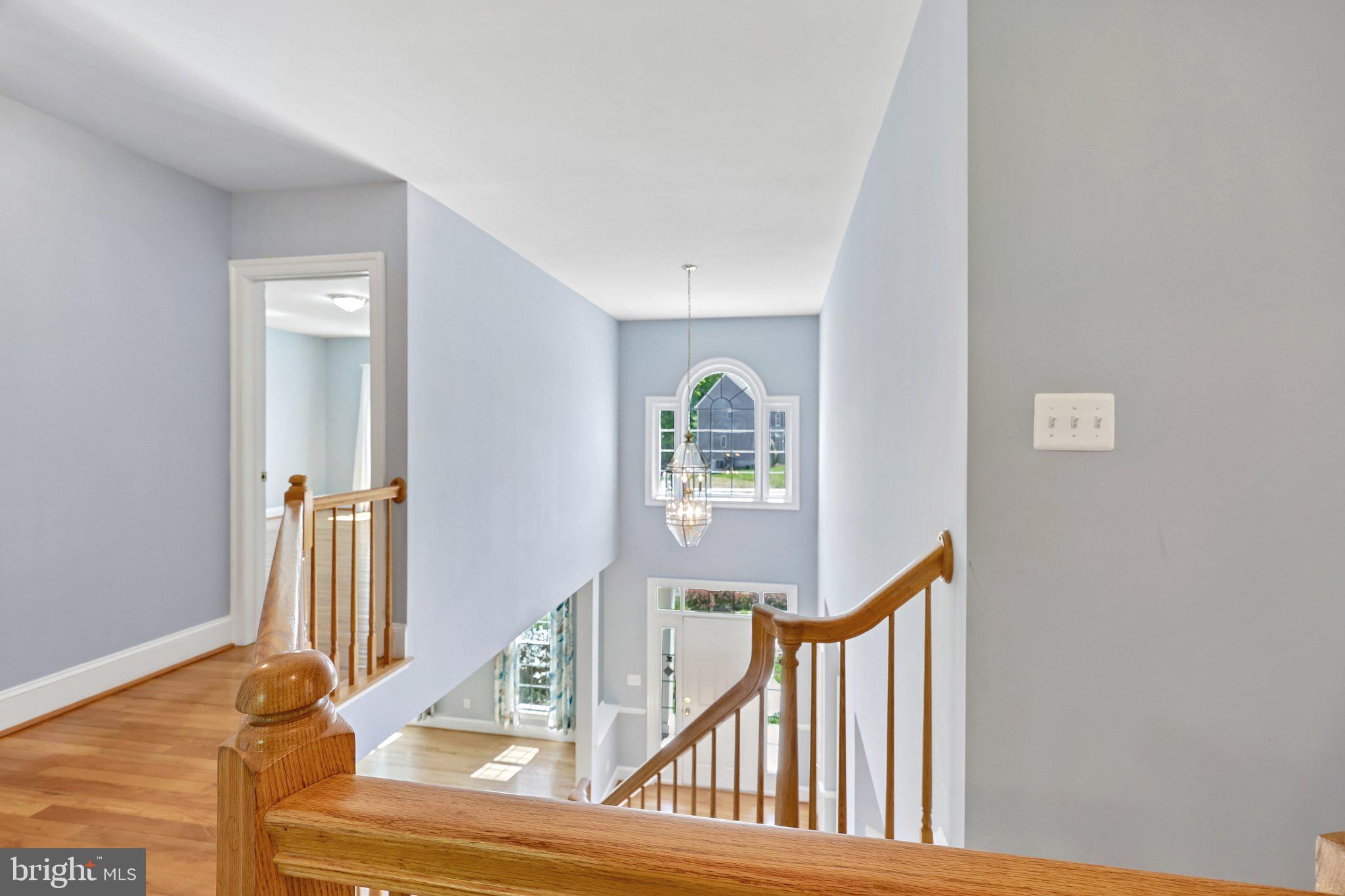 3519 Katrina Court Triangle, VA 22172 - Photo 37 of 101 a view of staircase with railing and white walls