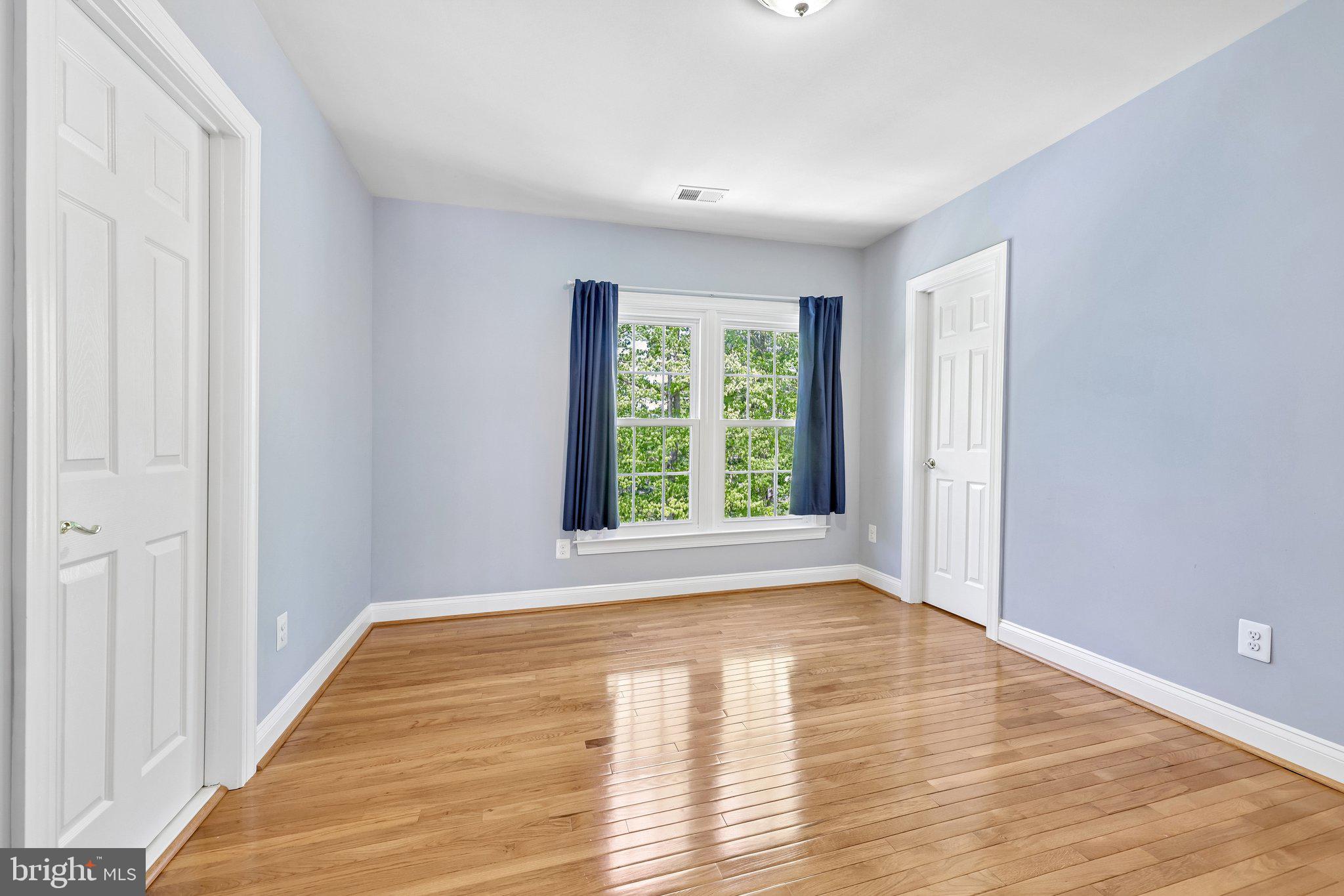 3519 Katrina Court Triangle, VA 22172 - Photo 42 of 101 a view of empty room with wooden floor and fan