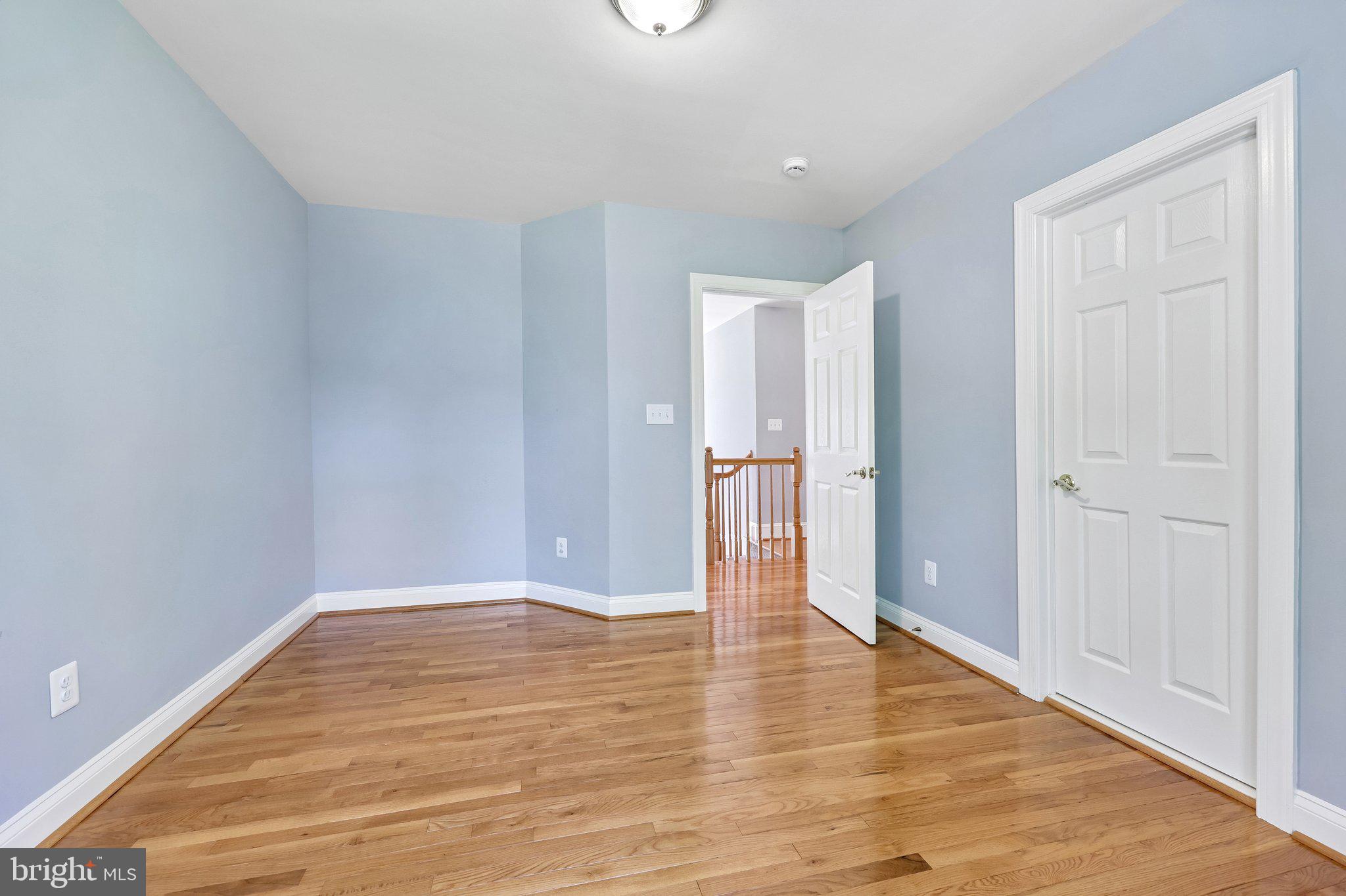 3519 Katrina Court Triangle, VA 22172 - Photo 43 of 101 a view of an empty room with wooden floor