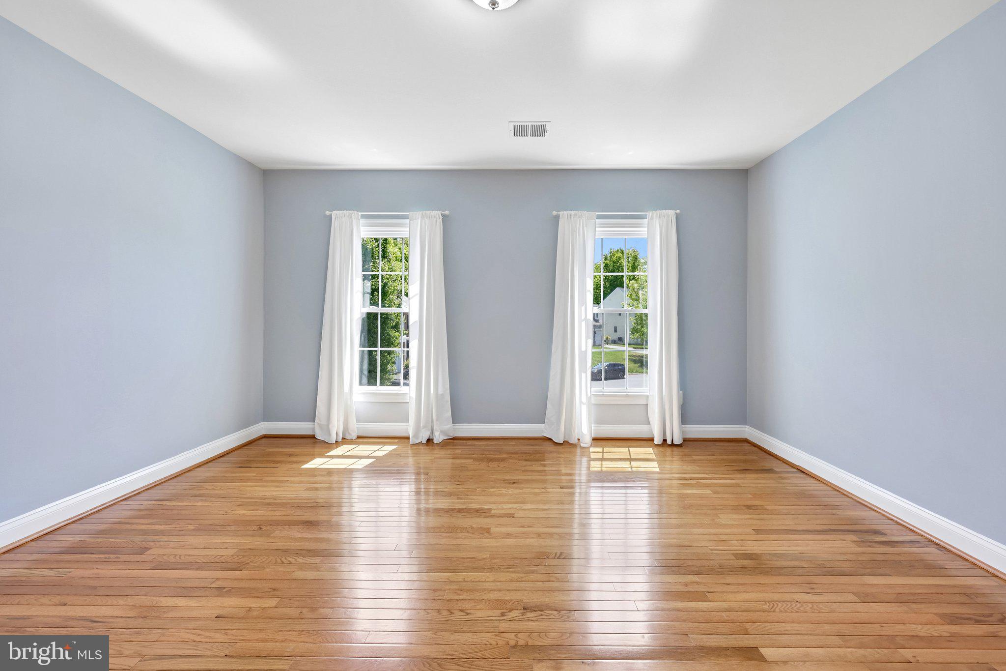 3519 Katrina Court Triangle, VA 22172 - Photo 46 of 101 a view of an empty room with wooden floor and a window
