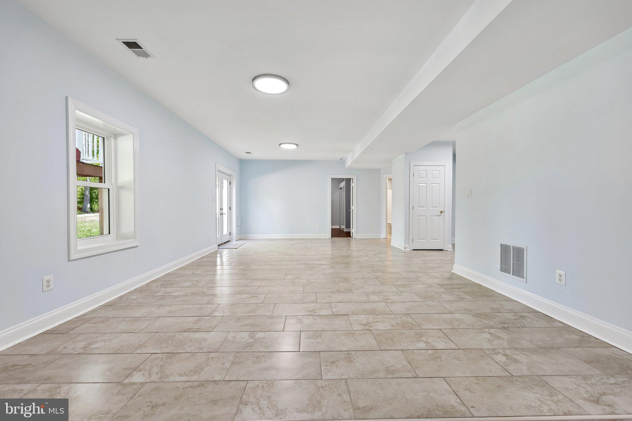 3519 Katrina Court Triangle, VA 22172 - Photo 59 of 101 a view of an empty room with windows and closet