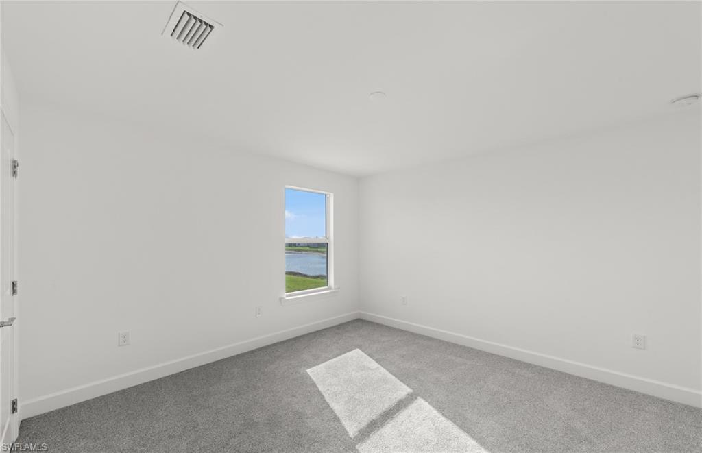 12404 Basalt Lane Alva, FL 33920 - Photo 15 of 50 a view of an empty room and a window