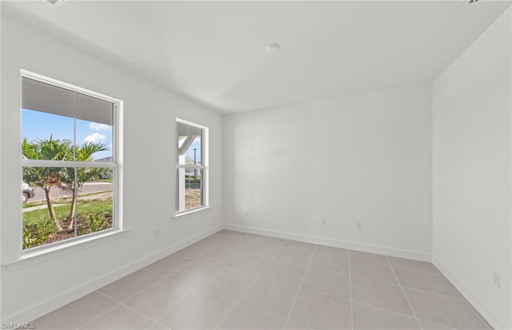 12404 Basalt Lane Alva, FL 33920 - Photo 18 of 50 an empty room with windows