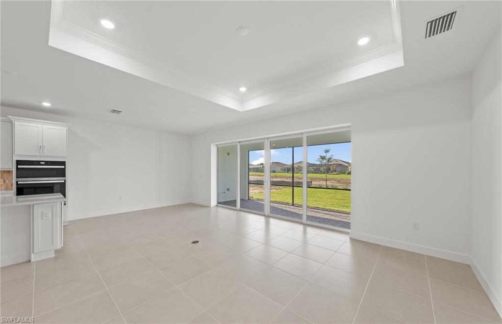 12404 Basalt Lane Alva, FL 33920 - Photo 19 of 50 a view of an empty room with a window