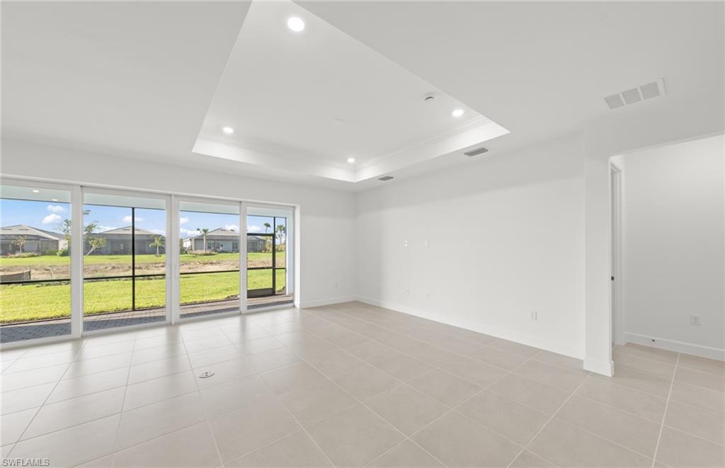 12404 Basalt Lane Alva, FL 33920 - Photo 21 of 50 a view of an empty room with a window